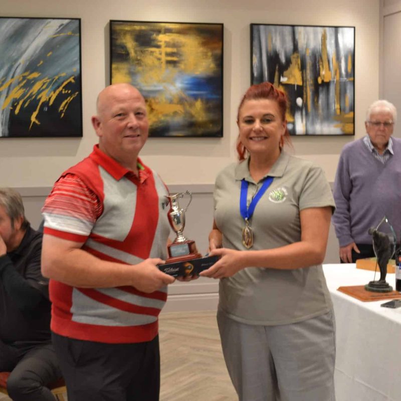 Darryl Payne being presented with Claret Jug Trophy for Overall Winner